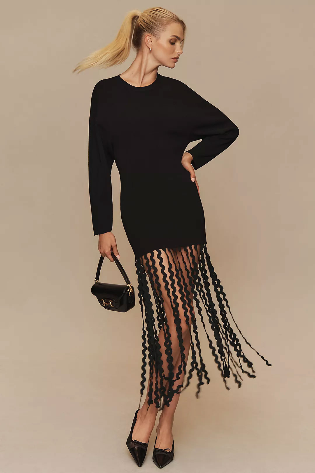 black dress with ric rac fringe