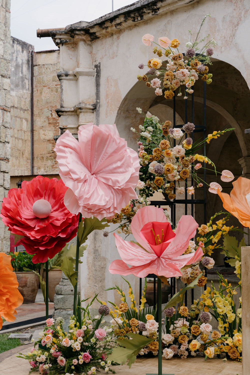 pink and red giant flowers for mexico wedding